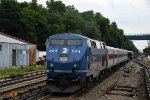 Inbound commuter shoves out of its station stop